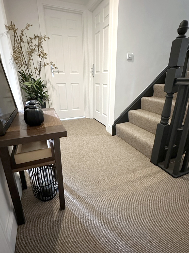 beige and brown striped landing carpet